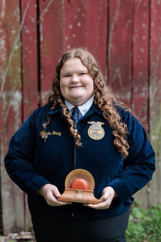 Young Earns State Degree